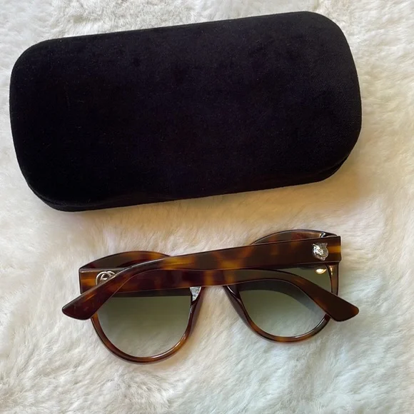 Gucci GG0028 Sunglasses feature an oversized cat-eye shape for women in brown. - Picture 6 of 11